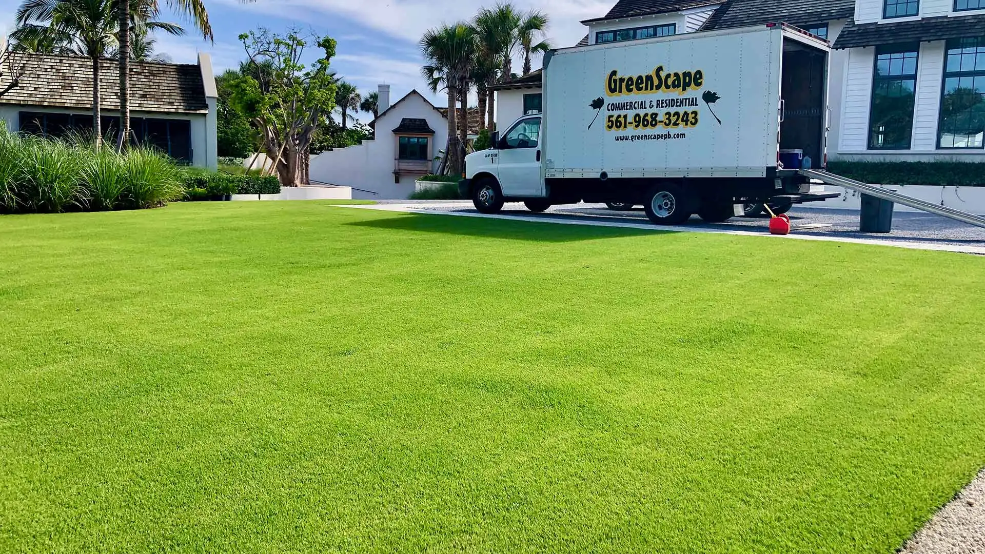 This luxury home uses fertilization and weed control treatments in Manalapan, FL.