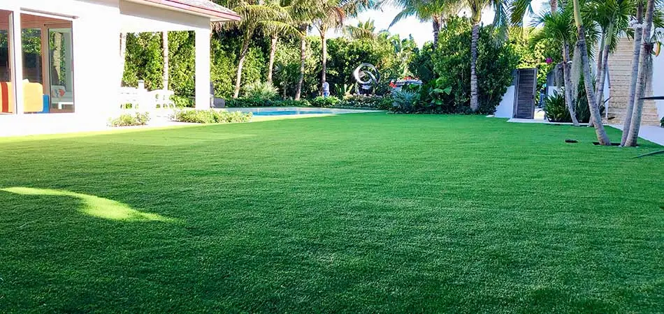Custom artificial turf and landscaping installed at an oceanfront Palm Beach home. 