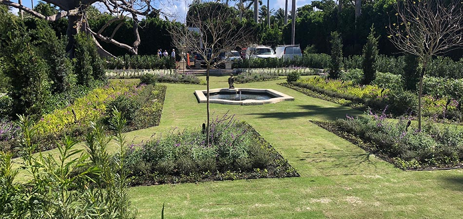 Custom landscaping installed at a historic Palm Beach, FL estate.
